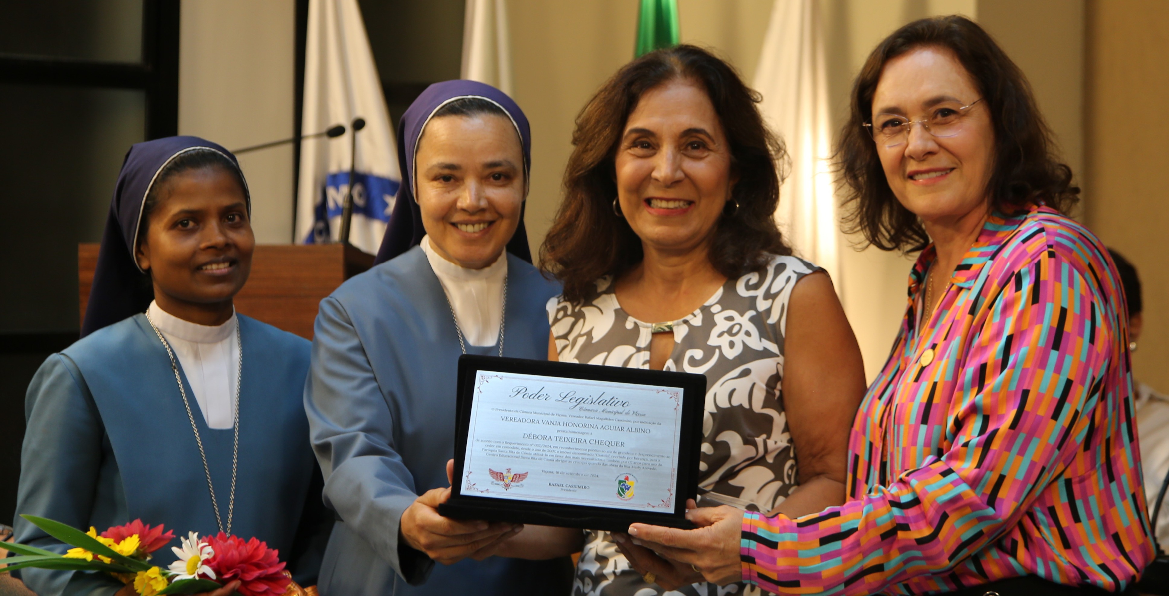 Homenagem a Débora Teixeira Chequer em reconhecimento público pelo ato grandioso em ceder o seu imóvel denominado "Castelo" para a Paróquia Santa Rita de Cássia para ser usado em favor dos mais necessitados